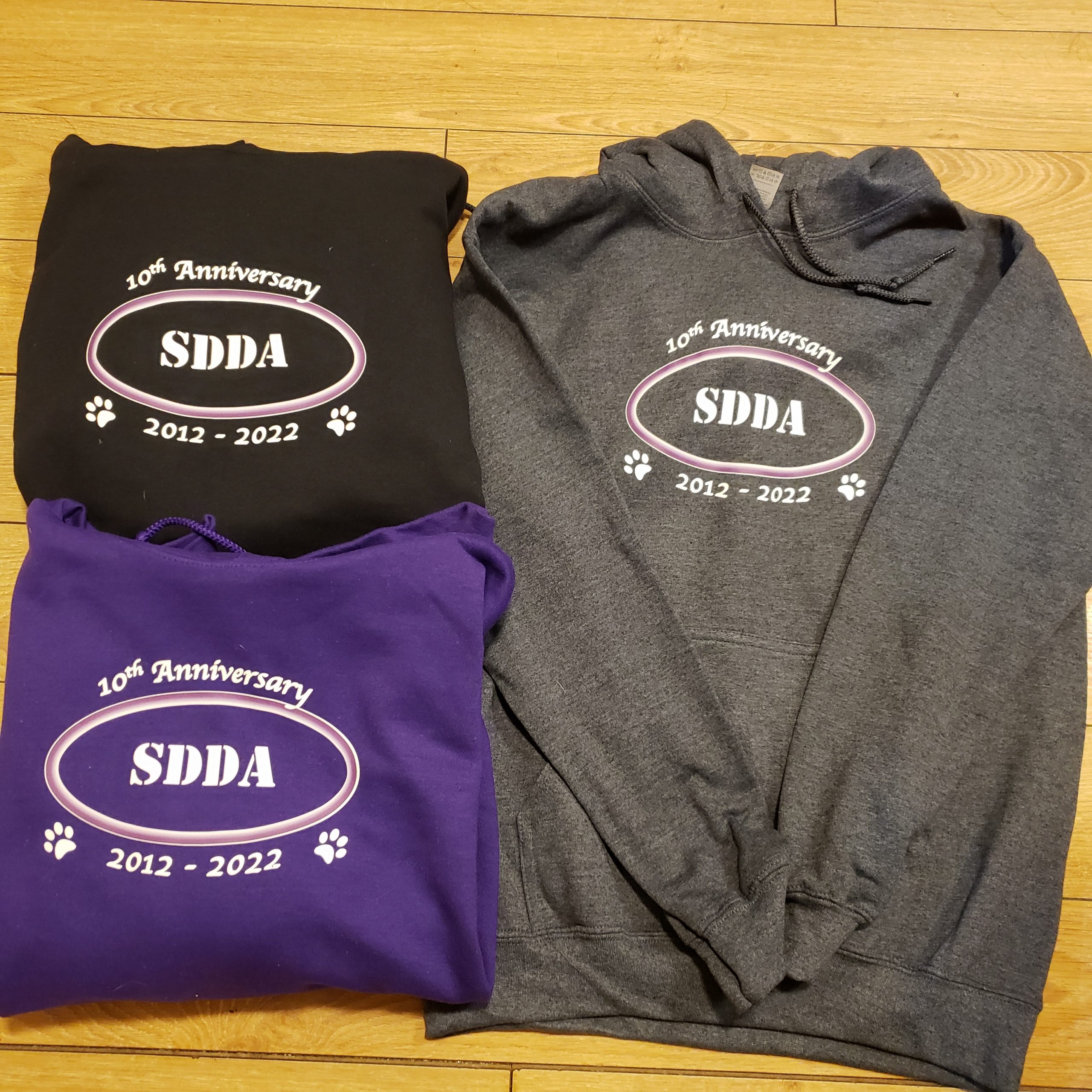 SDDA Anniversary Bunnyhug Sweatshirt – Sporting Detection Dogs Association